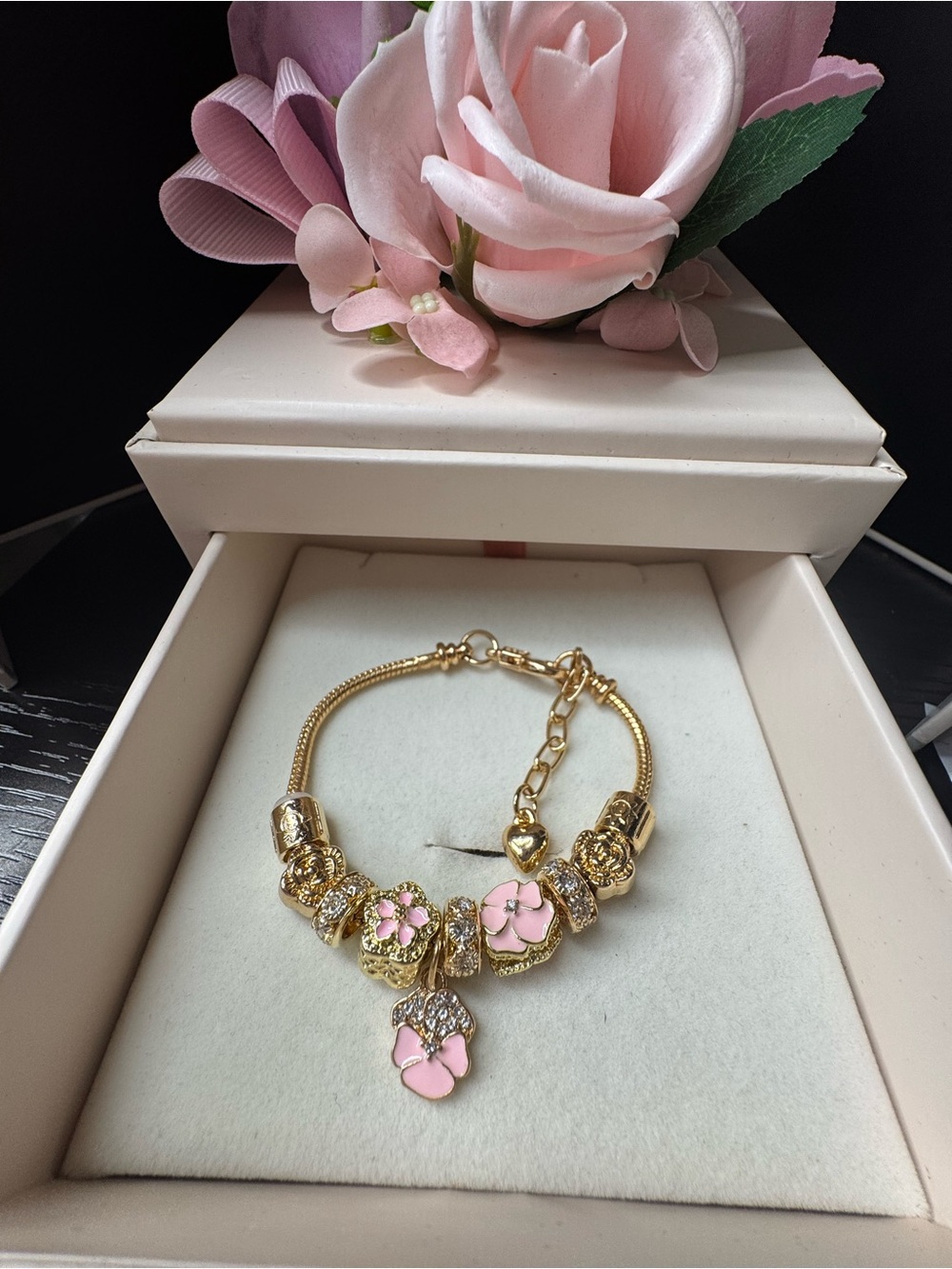 Gold Bracelet with Pink Flower Charms and Crystal Accents